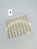 Assortment of gold brand nail stickers. Please match style number to picture number